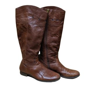 Audrey Brooke leather riding boots with flower detail
